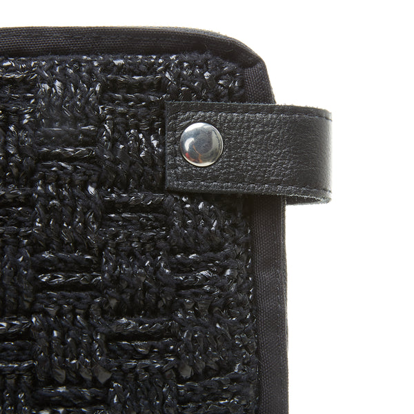 Detail view of Kreskros Pouch made from recycled plastic knit, combined with genuine leather and high quality organic canvas